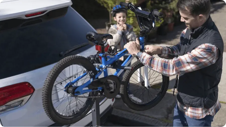 Father and kid happy with new car