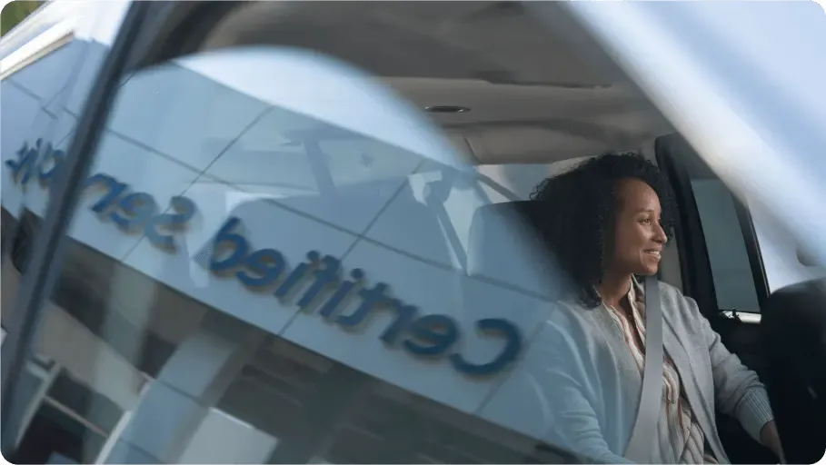 Woman sitting in car