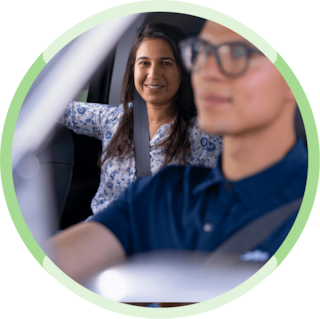 Woman smiling in car