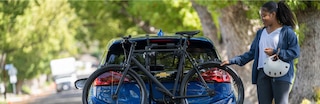 Woman grabbing bike